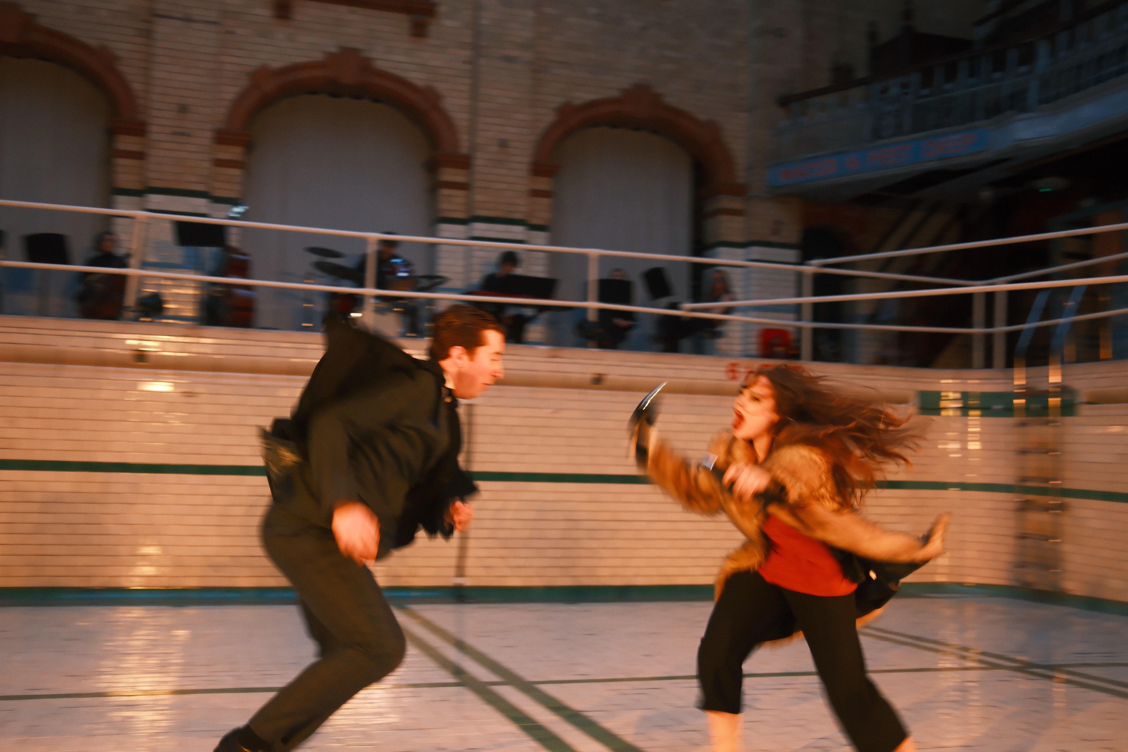 A blurred chase across the tiled floor, blade raised.