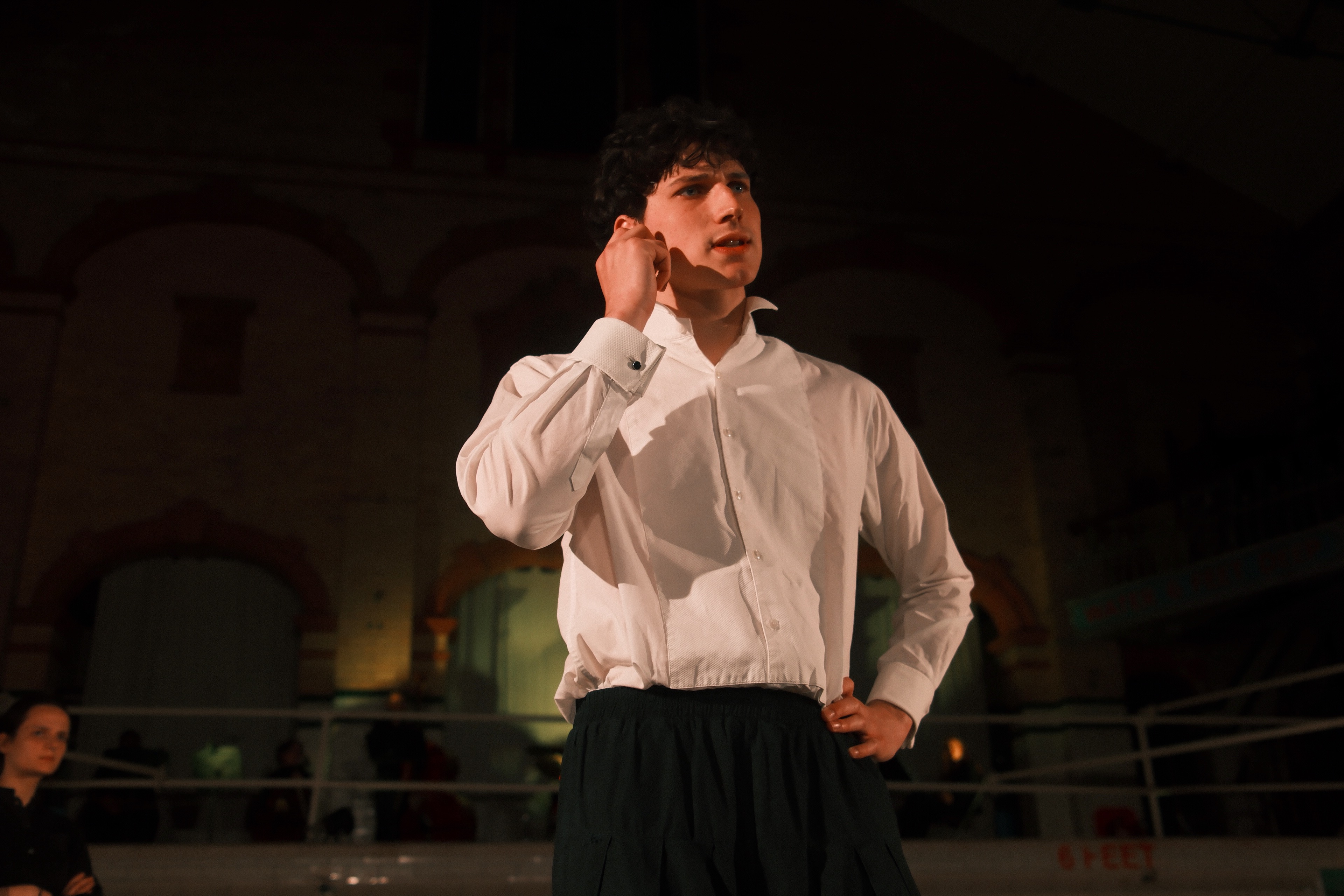 Hamlet mid-monologue in a low-lit interior of Victoria Baths.